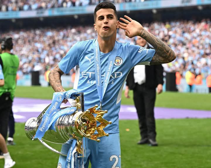 If Cancelo when the league with Barcelona that means he has done it in 5 different countries 

Primeria liga  (Portugal) : 2013/2014 (Benfica)

Seria A (Italy) : 2019/2018 (Juventus)

Premier league (England) : 2020-2021, 2021-2022, 2022-2023 (Manchester City)

Bundesliga