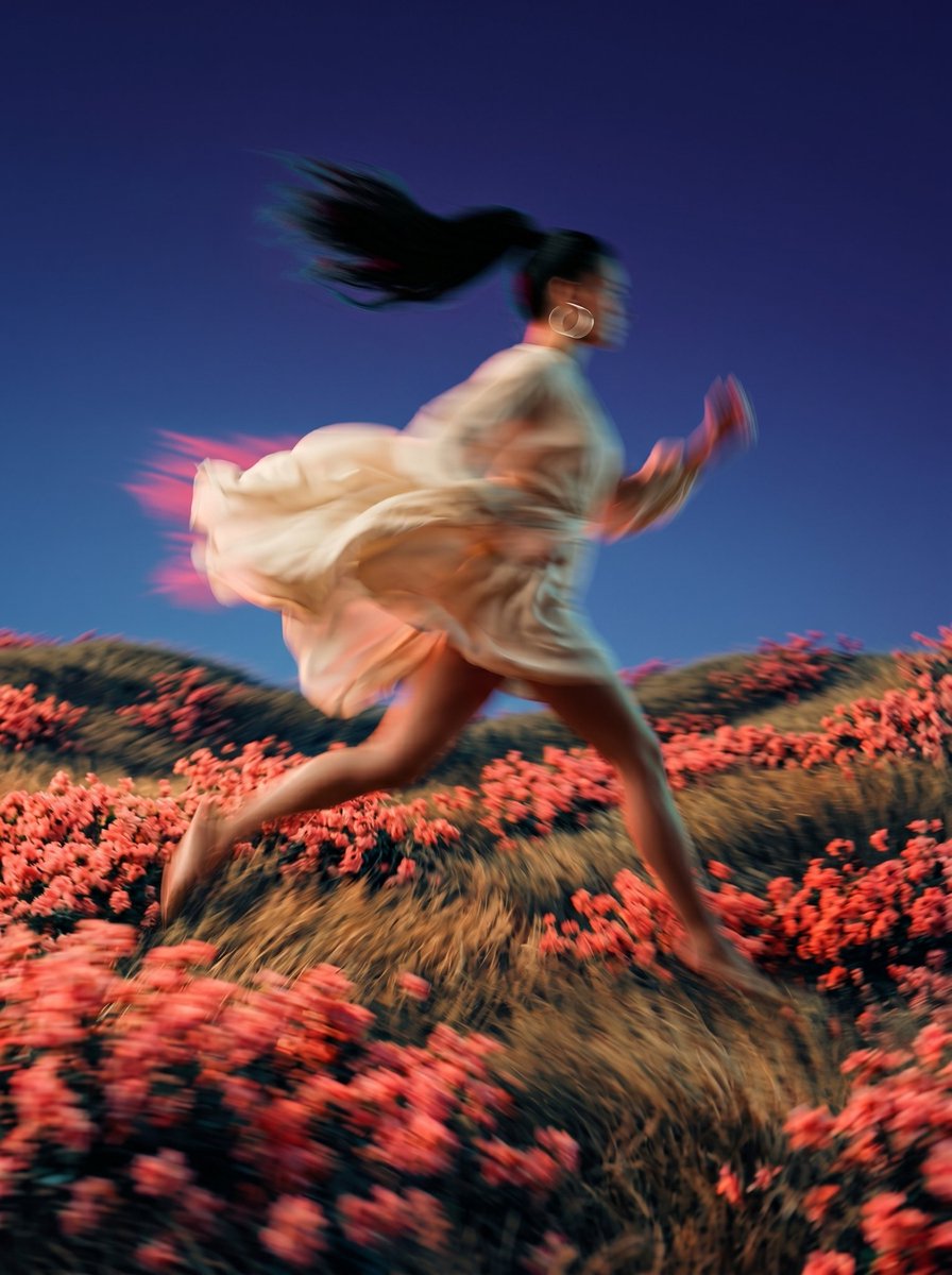 A dynamic, low-angle medium shot captures the blurred motion of the person in re