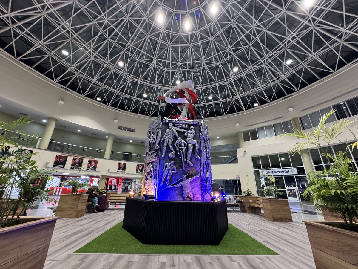 brentito86's tweet photo. Another change in Piarco Int’l! Starbucks has moved to the Arrivals Hall and the Atrium now features this sculpture showcasing different aspects of T&amp;T culture. https://t.co/c6ooAWKBBY
