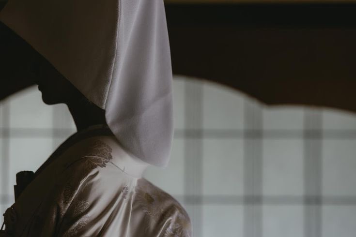 utahims's tweet photo. [@strongestgrade1] 💍

*The ceremony hall had filled, quiet anticipation settling in the air.
At the altar, Atsuya stood waiting.*

*Outside, Utahime adjusted her grip on her sleeves, the doors opening ahead of her.* https://t.co/nC7oaZgWBk