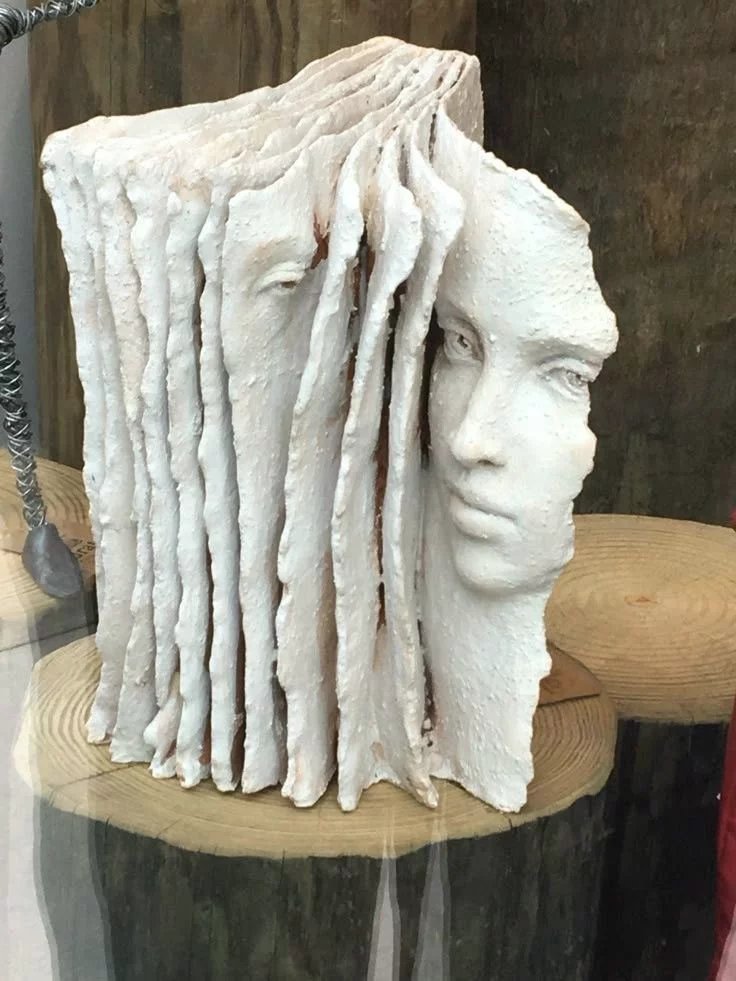 HerodotusWave's tweet image. The work of Italian artist Paola Grizi, known for her pensive and emotional figures that seem to emerge from the pages of books.