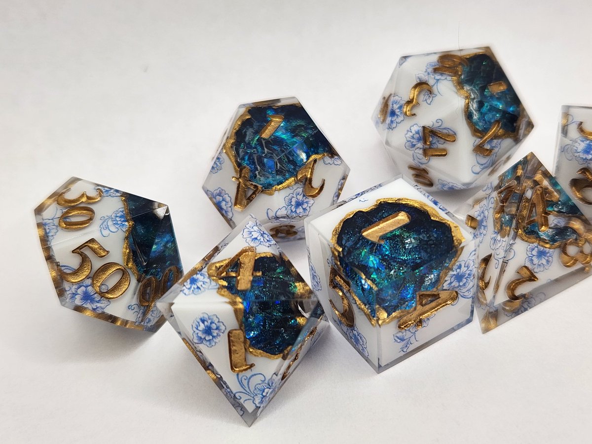 Sinnamon_Dice's tweet image. Porcelain Dice Set with Pale Gold Numbering ✨️ 
#dnd #ttrpg #handmadedice #dice #dungeonsanddragons