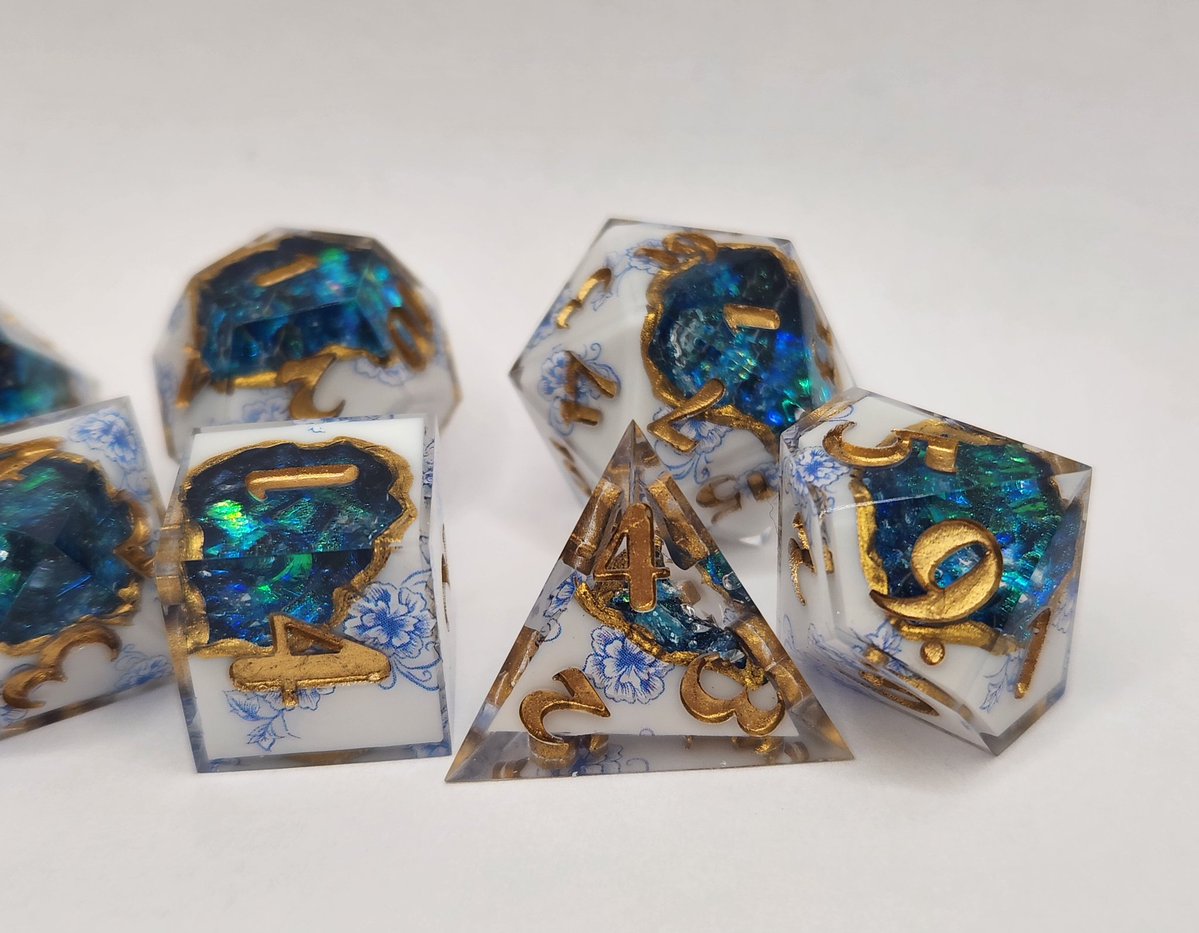Sinnamon_Dice's tweet image. Porcelain Dice Set with Pale Gold Numbering ✨️ 
#dnd #ttrpg #handmadedice #dice #dungeonsanddragons
