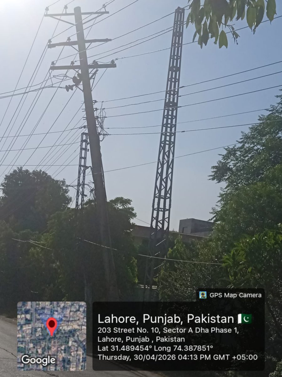 shahambabar's tweet photo. This dangerously tilted electric pole in DHA Phase 1 (Street 10, Lahore) has been ignored for over a year despite repeated complaints. Instead of fixing it, a temporary steel support was installed — a clear safety risk.

I was even asked to personally move files between DHA 1/2 https://t.co/8pBY4xBMRW