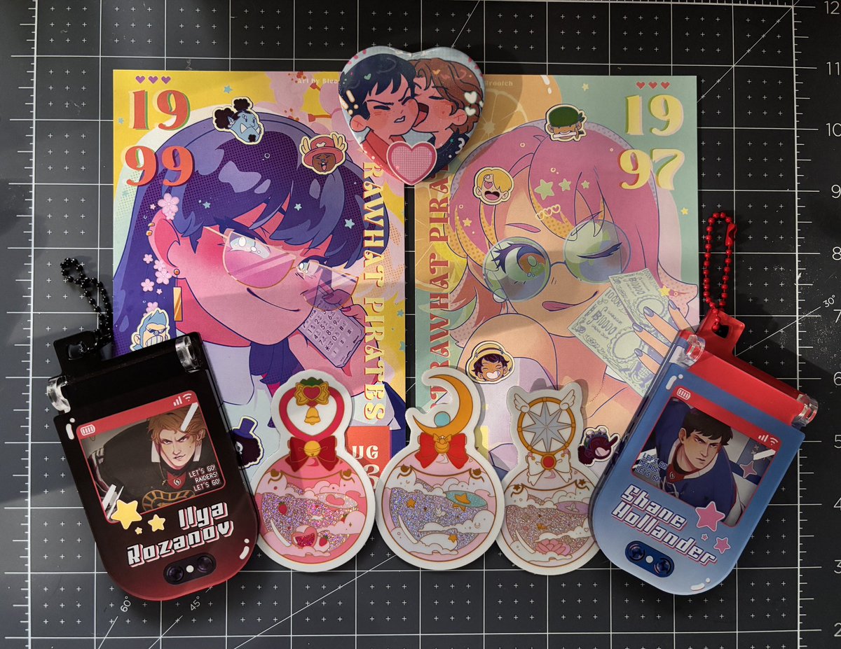causticsunshine's tweet photo. this is late but here’s my second #hollanov merch appreciation post 🏒 first pic goodies with the super cute phone charms are from @EleanorGrootch   (tysm for the bonus treats!!) and the others lovely finds are from @segseu 💕 (fox pc holder is from @storelattes btw!) https://t.co/QXSJqX7FHq