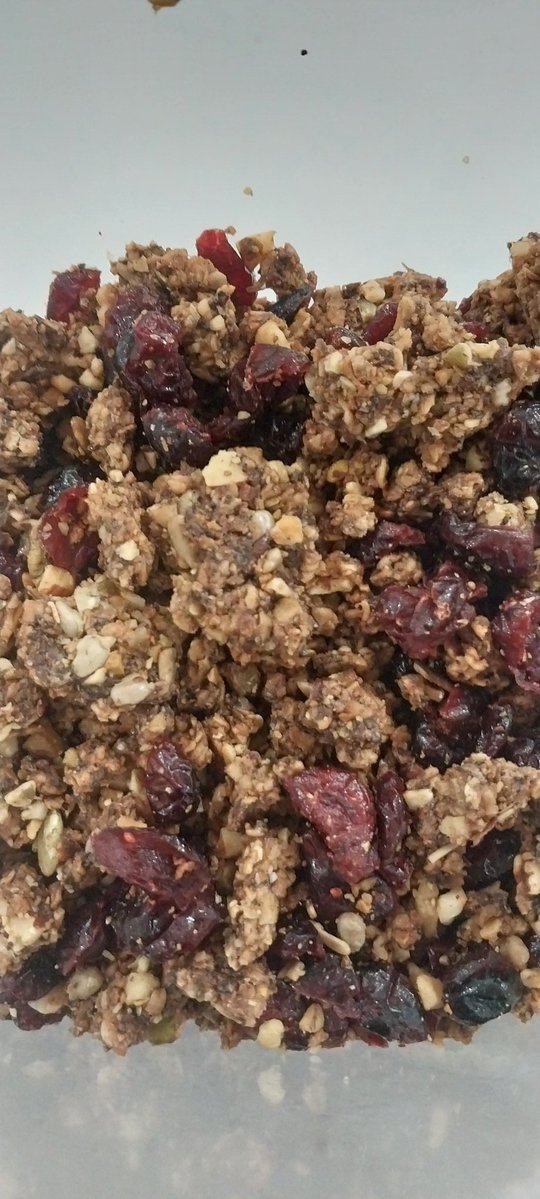 Every couple weeks, I make my granola,which I bring to work as part of my lunch. 

It has all kinds of good stuff in it: oats, walnuts, pecans, almonds, pistacios, sunflower seeds, pumpkin seeds, chia seeds, poppy seeds, cocoa powder, honey, vanilla, and lots of extra virgin