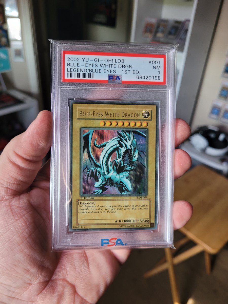 It's here and I'm so happy. 1st Edition Wavy and faded LOB-001 Blue-Eyes  White Dragon. I never thought I'd own cards like these, but I'm so happy  that I had pushed myself