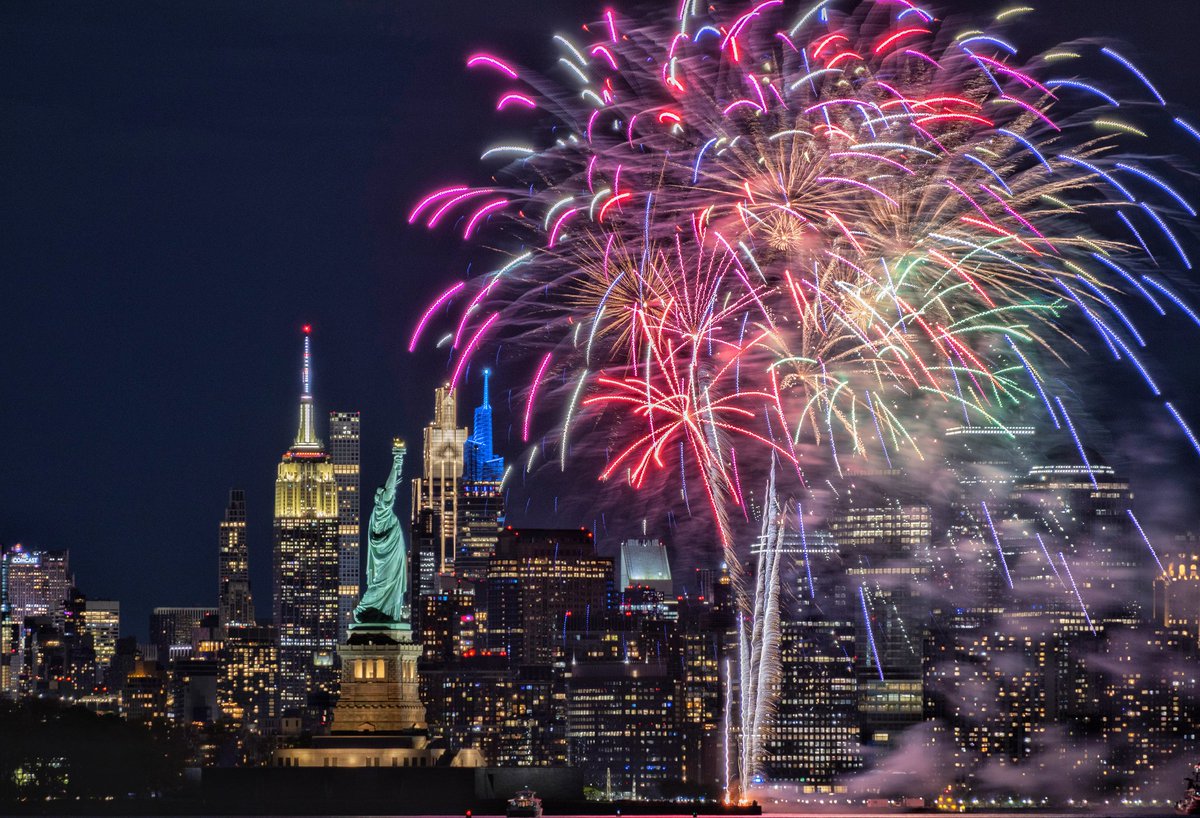 GaryHershorn's tweet image. Fireworks illuminate the sky between the Empire State Building, Statue of Liberty and One World Trade Center marking an event at Ellis Island in New York City, Saturday evening #newyork #newyorkcity #nyc @EmpireStateBldg #statueofliberty #fireworks