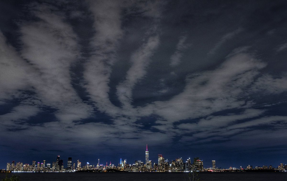 GaryHershorn's tweet image. The skyline of New York City, seen from the southern end of Jersey City, NJ, Saturday evening #newyorkcity #nyc #newyork @empirestatebldg #statueofliberty