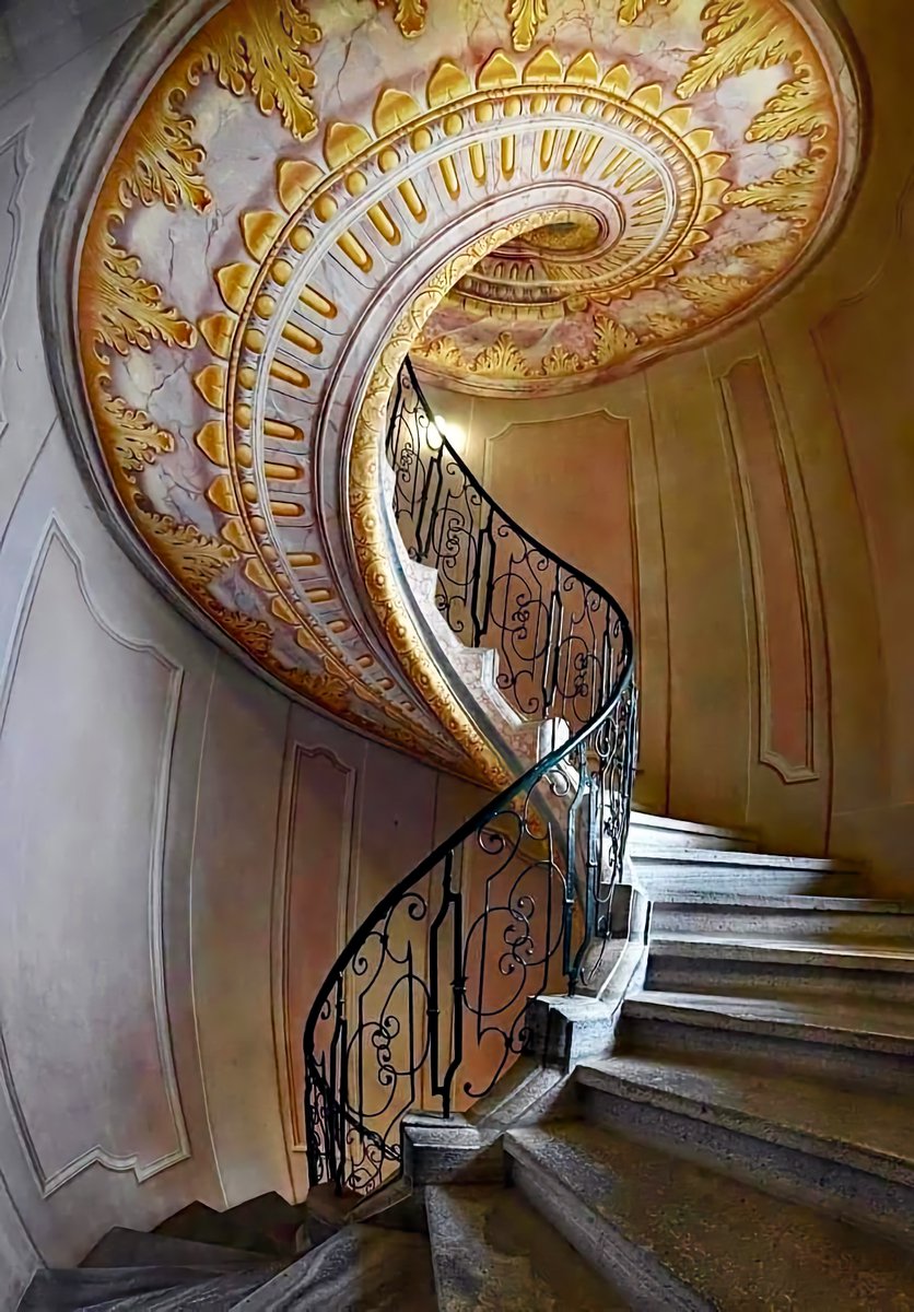 A spiral of Baroque brilliance in Melk Abbey’s 1736 staircase.