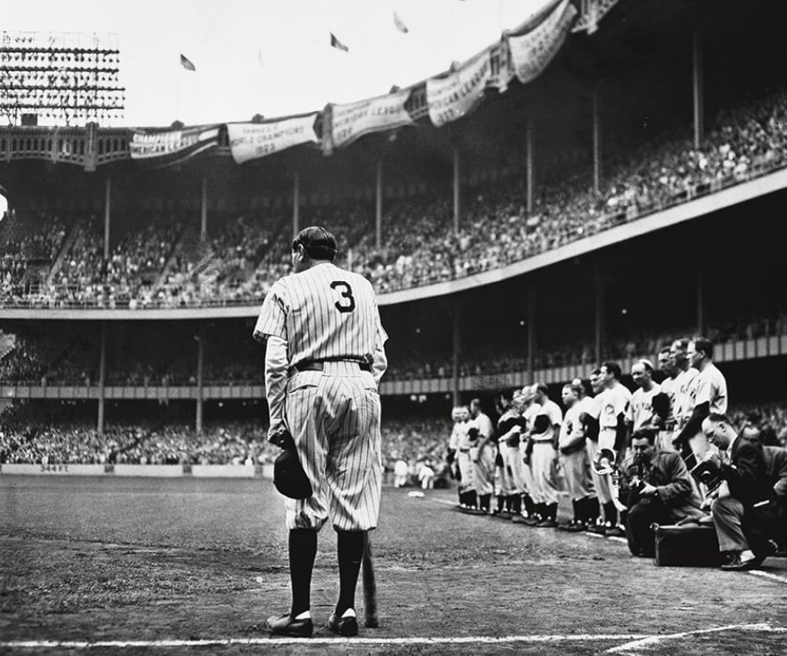 Jimfrombaseball's tweet photo. "June 13, 1948, was a special day in Yankees’ history, as the club celebrated the 25th Anniversary of Yankee Stadium.
Among the highlights was a reunion of the 1923 Yankees team – the first team to play in Yankee Stadium, and the first Yankee team to win the World Series.
Most importantly, the June 13, 1948 occasion featured “Babe Ruth Day” with a special ceremony during which the Yankees formally retired a dying Babe Ruth’s uniform #3 and sent it to Cooperstown.
During the ceremony, an emotional crowd of 49,641 fans sang ‘Auld Lang Syne’ to the Babe.
The historic day marked the great Bambino’s final appearance in a Yankees uniform and at Yankee Stadium.
Ruth passed away just two months later on August 16th.
"Babe Ruth Bows Out"
Art by Nathaniel Fein.
"All the photographers were in the front, and I wanted to see how Ruth looks from the back.
So I figured, well, number three is out.
The Babe bows out…”
Nat Fein.
This image won the 1949 Pulitzer Prize for Photography.
Ty Cobb, now 60 years old, led off the game in the first inning.
Cobb turned to catcher Wally Schang and said:
"Would you mind backing up a bit?
I’m an old man now, and I can barely hold on to this bat.
I am worried I will hit you with it."
Schang respectfully obliged, only for Cobb to lay down a bunt and attempt to beat it out for a hit.
Cobb missed by only a step.
After the game, Ty Cobb and Babe Ruth were photographed together for the last time.
"Whether from pain or medication or emotion, Ruth’s eyes were wet when Cobb laid his hand on Ruth’s right shoulder.
The moisture caught the flash of the camera."