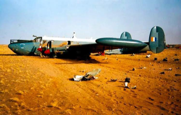thyphoidjack's tweet photo. The Crash of Pelican 16📷

On 13 July 1994, a South African Air Force Avro Shackleton MR.3, tail number 1716, known as “Pelican 16,” made a forced landing in the Sahara Desert during a long range flight to the United Kingdom. The aircraft had been restored to flying condition earlier that year and was en route to take part in the Royal International Air Tattoo at Fairford, England.

The planned route from Cape Town to Duxford included stops in Gabon, Ivory Coast, and Portugal. Shortly after departing Abidjan, the crew, comprising active duty SAAF personnel, encountered serious engine problems over the desert.

The first issue involved engine #4, which began overheating and was shut down as a precaution. Power was redistributed to the remaining engines. Soon after, engine #3 emitted sparks and caught fire. The crew managed to extinguish the fire using the onboard suppression system, but the propellers failed to feather and continued windmilling at roughly 150 RPM.

In an effort to maintain altitude, engine #4 was restarted. It quickly overheated again, showing a white hot glow in the exhaust, and was shut down a second time. Its propellers also failed to feather, spinning at approximately 650 RPM.

With two windmilling propellers on the same wing, the aircraft experienced severe asymmetric drag and began losing altitude rapidly. A crash landing became unavoidable. The aircraft came down on a rocky outcrop about 14 km from the border of Western Sahara and Mauritania, skidding roughly 243 m across sand and rock before stopping.

All 19 crew members survived without serious injury. Stranded in a remote desert area within an active conflict zone, they laid out orange flight suits and single-man dinghies to form the message “19 OK” as a distress signal. A French Navy Atlantique II patrol aircraft, operating from Dakar, located them after being dispatched at 04h00 GMT. The crew was subsequently rescued and returned to South Africa.

The investigation pointed to a probable failure in the Translation Unit of engine #3, which controls the contra-rotating propellers. The unit, positioned between the propellers, appears to have failed due to internal mechanical stress following the shutdown of engine #4, although the exact cause was not conclusively determined.

Pelican 16 remains at the crash site in the desert. Its remote location and regional instability have prevented recovery, and the aircraft continues to deteriorate under exposure to the elements.
