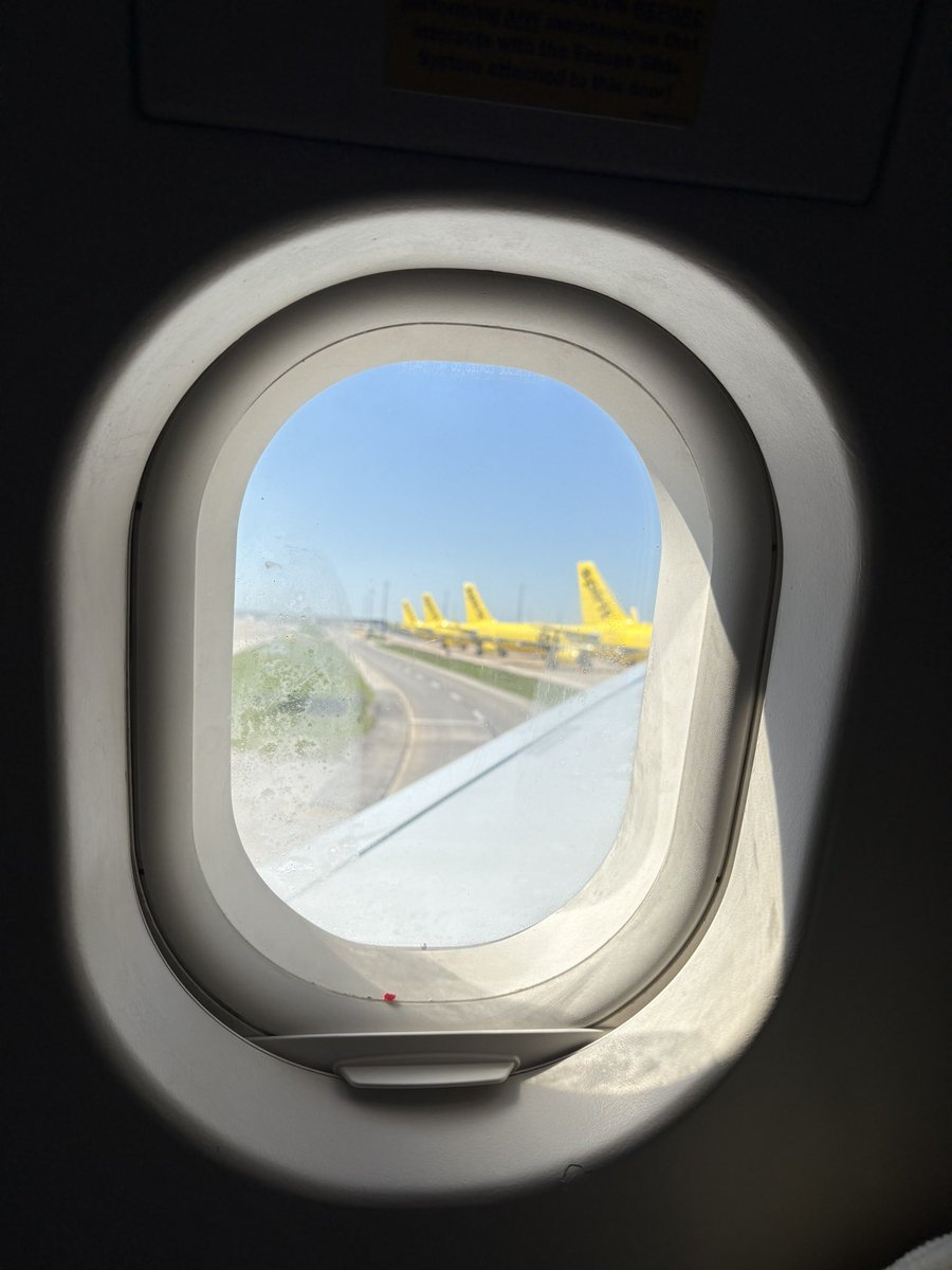 baugh_elliot's tweet image. I just flew into DFW from Denver and on our taxi in I caught a glimpse at about 7 former @SpiritAirlines jets parked on remote stands south of Terminal E! It’s really sad for me to see these jets basically just abandoned! #spirit #aviation @MCCCANM @Combat_learjet @SteveNomadic