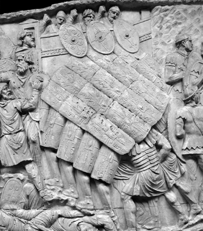 DrJEBall's tweet image. The famous #Roman military testudo ('tortoise') formation, as depicted on Trajan's Column in #Rome; it gives a good insight into how protected Roman soldiers were when part of the testudo 🐢⚔️ (📷 trajans-column.org)