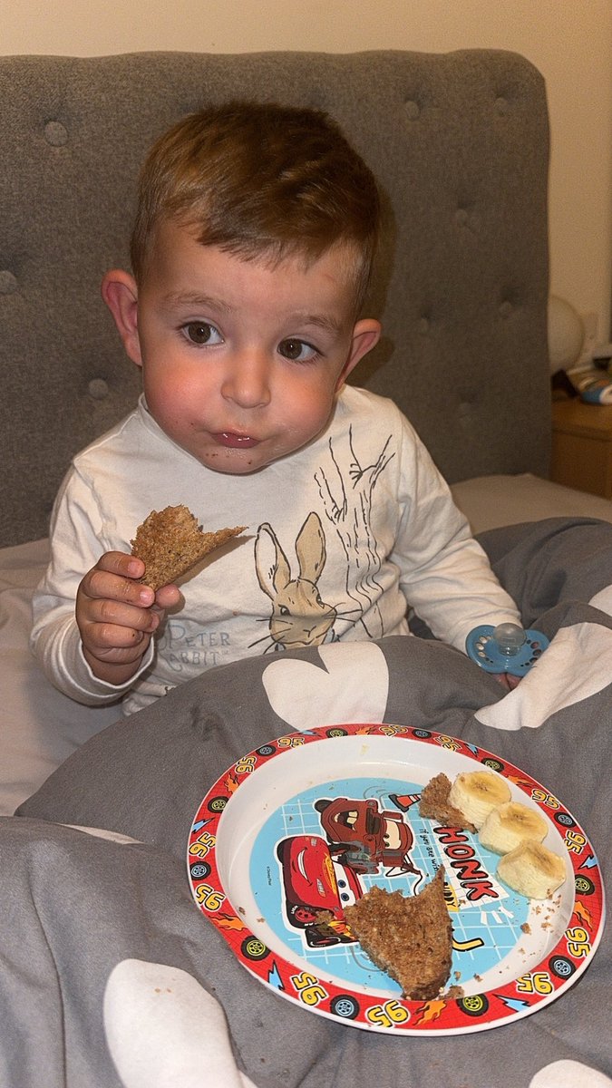 cazzag96's tweet photo. Lay in bed with the nephew and he says “Caroline, I hungry”. Best believe he got a slice of toast (one was for me), banana and milk 🥺 
Then I realised I forgot to give him supper and the guilt was strong 😭
He’s now polished off his supper and is back to lying in bed ❤️ https://t.co/cHs1JY55jL