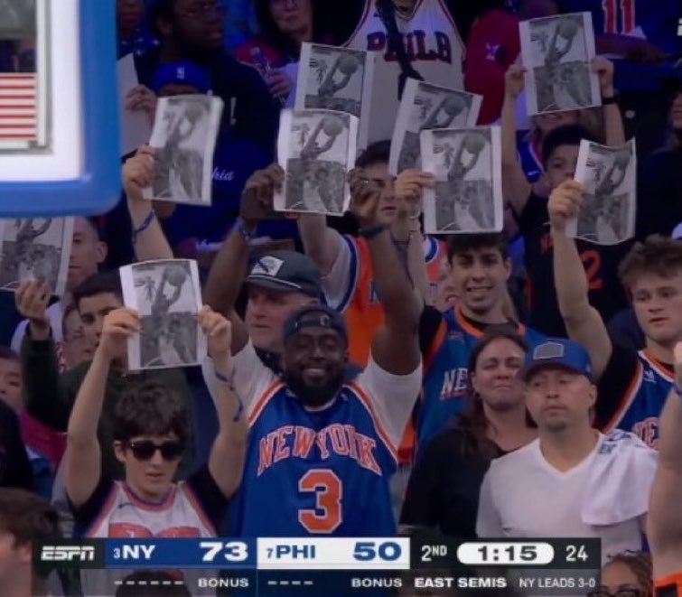 PardonMyTake's tweet photo. THIS LEAGUE!!!

Knicks Fans holding up a picture of Mitchell Robinson dunking on Embiid while Embiid is at the line https://t.co/mcnNJwvInn