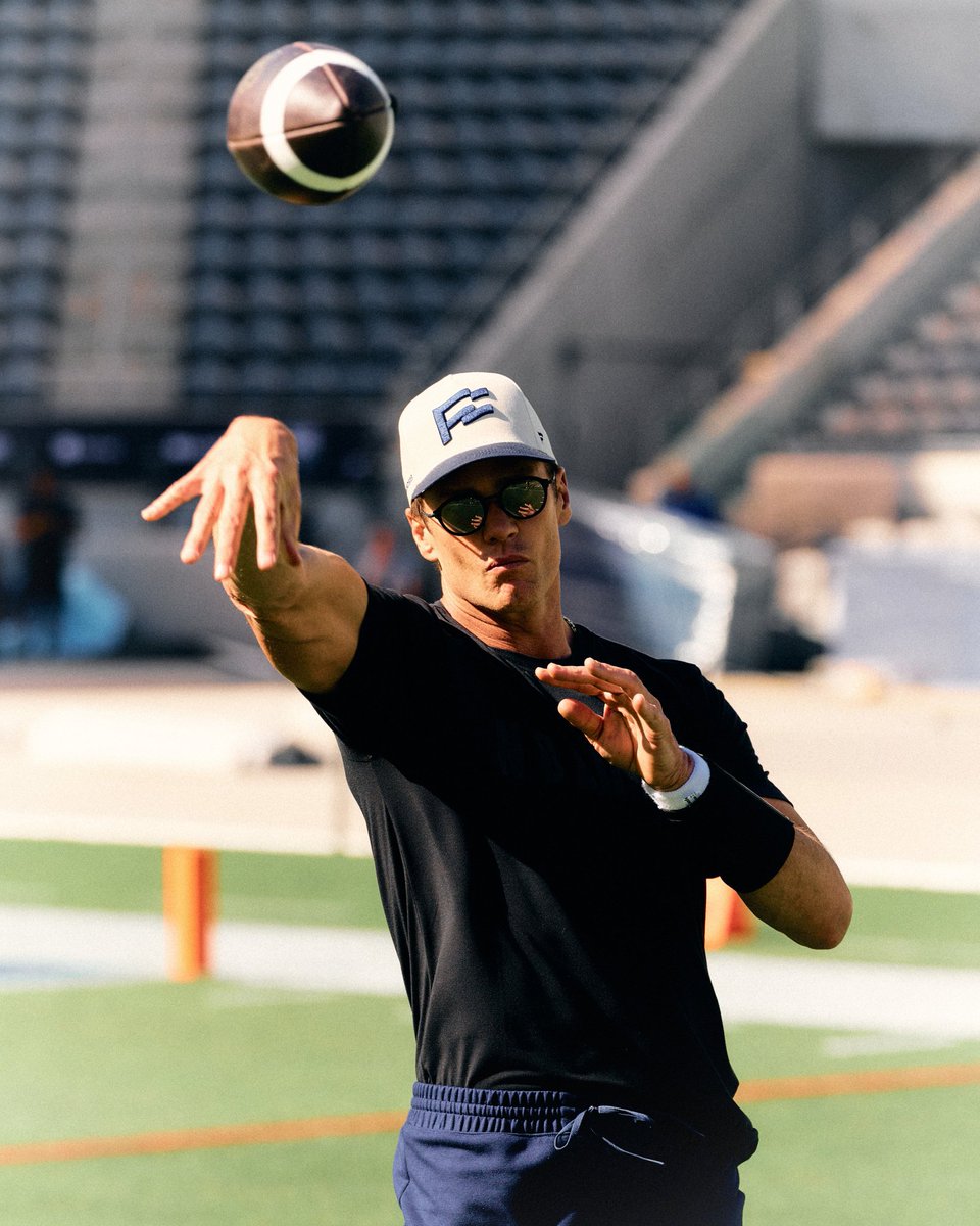 no pads or helmets, just kids throwing, running, catching a football