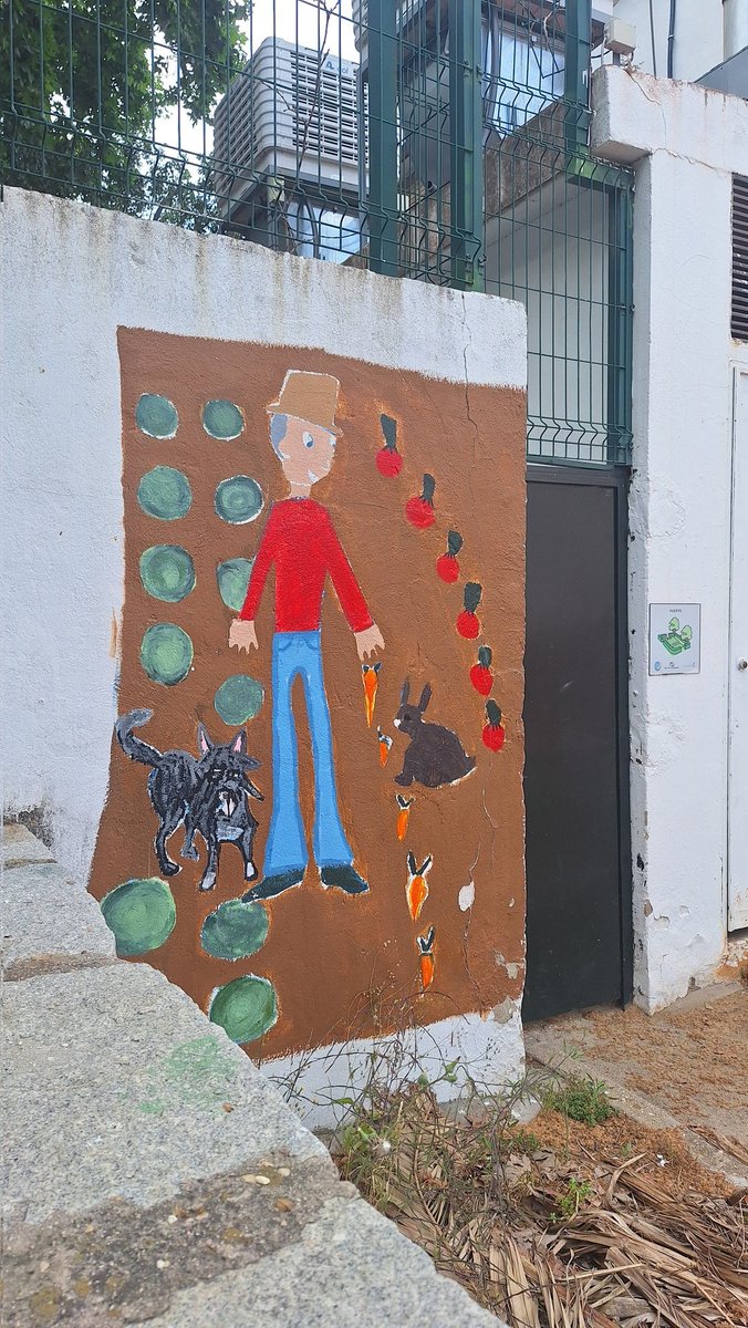 Me encanta el mural de esta guardería en la que parece Freddy Krueger dando de comer a unos conejitos...antes de desollarlos, me imagino.