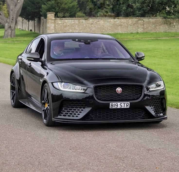StarlaClark7's tweet photo. Wide-body, carbon details, and a V8 that sounds like a thunderstorm. This Jag owns the road before the wheels even turn. 🏁 https://t.co/4j5bEirSMX