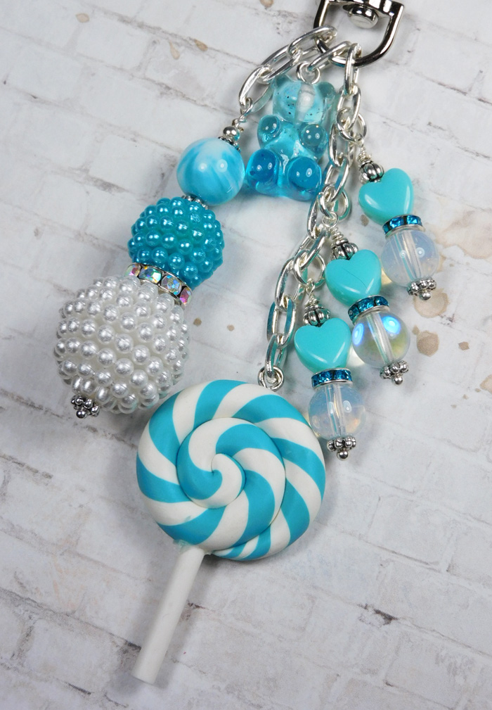 voudaux's tweet image. Aqua Blue White Swirl Lollipop Gummy Bear Purse Charm Bag Clip Handmade New ebay.us/m/seYb3F #eBay #shopsmall #gifts #giftsforher #giftidea #mothersday #buyhandmade #handmadewithlove #handmadebyme #ebayfinds