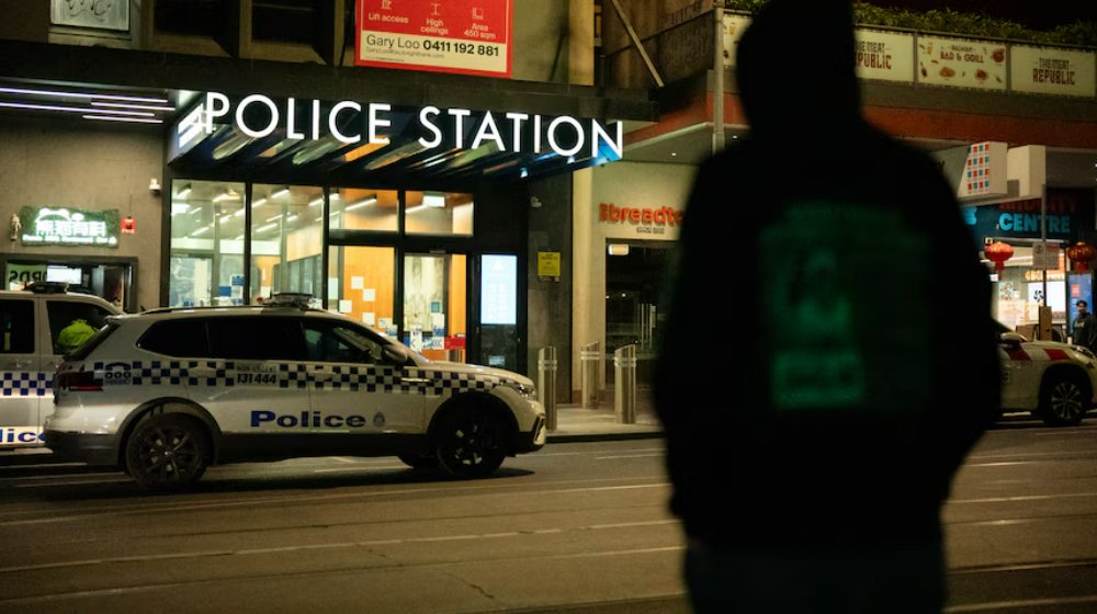 A hacker built a tool to track police officers.
Australian police officers can be tracked due to a security flaw in tasers and body-worn cameras

A man wearing a dark hoodie is silhouetted against the lights of a police station with police cars in front.
This hacker realised tech