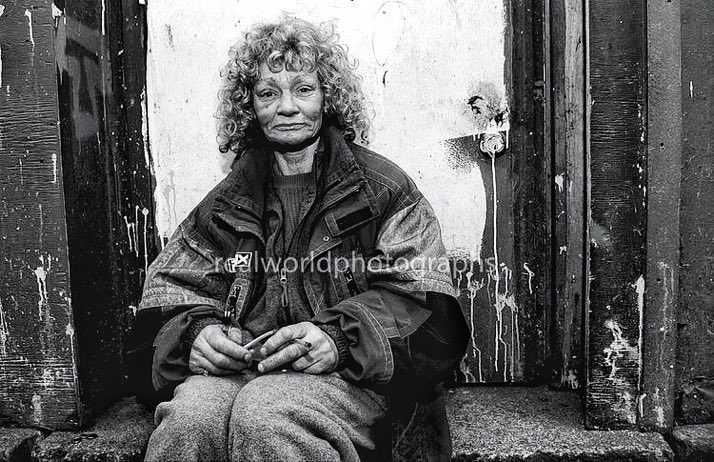 RealWorldImage's tweet image. A woman smokes drugs in an East Vancouver alley. British Columbia, Canada. Gary Moore photo. Real World Photographs. #Vancouver #streetphotography 
#poverty #Grok #photojournalism #women #drugs #Canada #Nikon #documentary #garymoorephotography #realworldphotographs