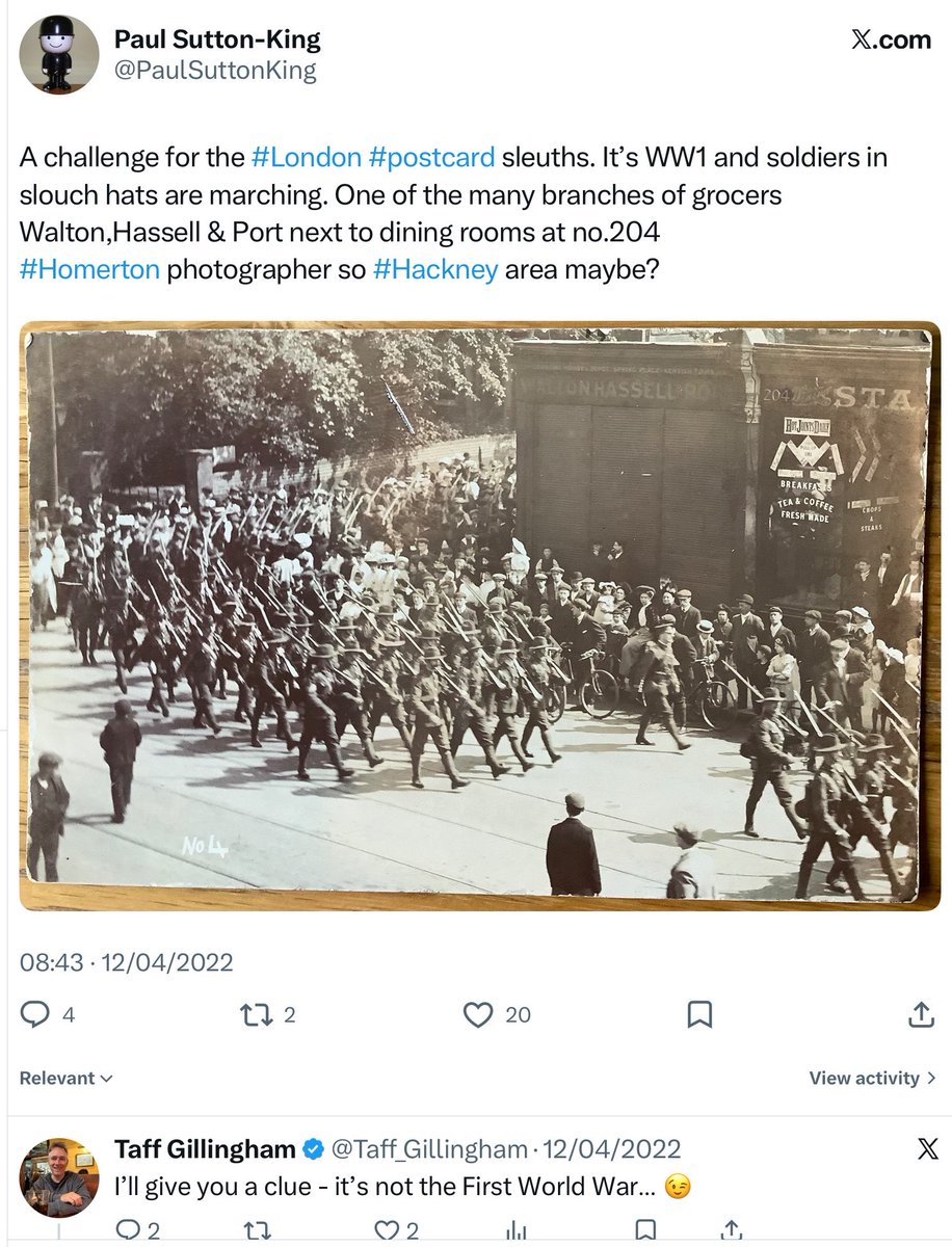 PaulSuttonKing's tweet image. In a first for mystery #postcard Monday we return to a unsolved challenge from the past. Long standing viewers may remember this military mystery from 2022. Unknown soldiers march around a corner in London, but who are they and where is it? 1/3