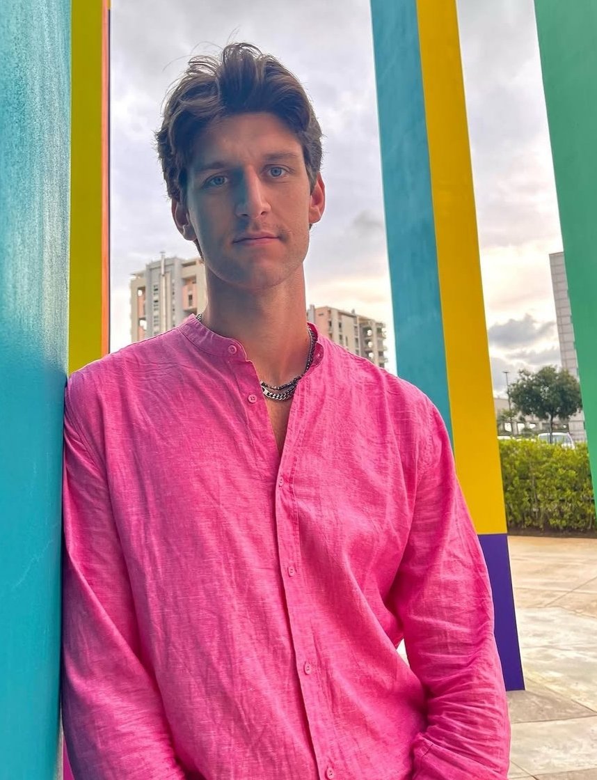 6'11.5  T.S. from Italy in a pink shirt