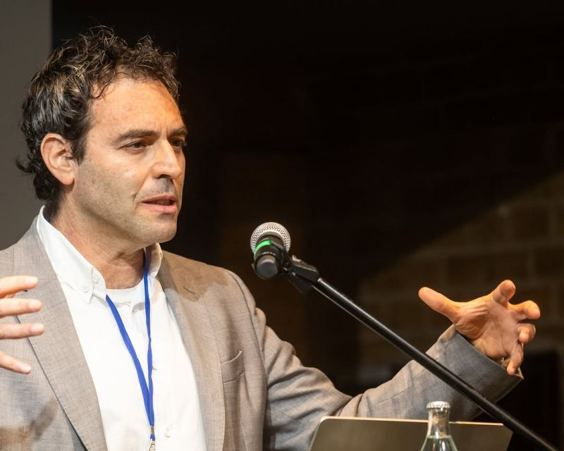 eitandi's tweet photo. Me talking about the unbearable gap between is (the realities on the ground) and ought (what international law requires) at a conference on Gaza in Berlin https://t.co/IAqe538E01