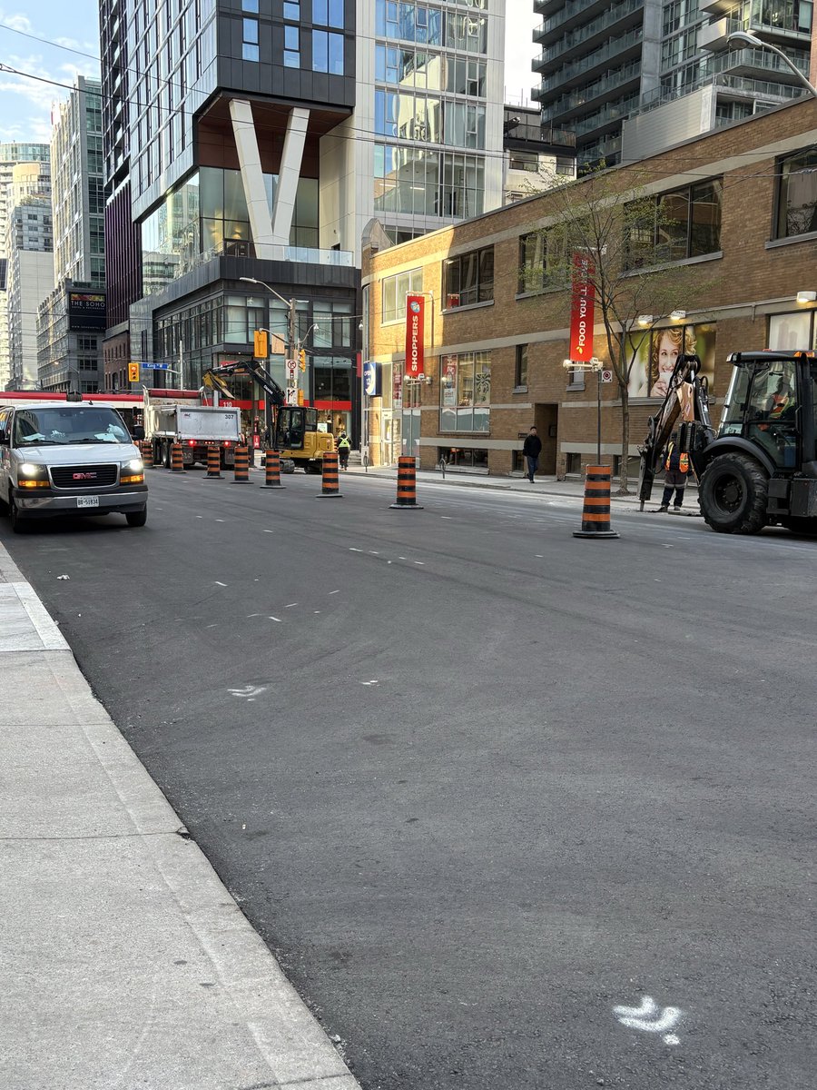Tem78's tweet photo. @CP24 @cityoftoronto can we get answers why roads are torn up, paved, then ripped up only a week or two later? Spadina and Bremner, Peter street? Just freshly paved last week and being jack hammered this morning!- https://t.co/rVTGbPfi70