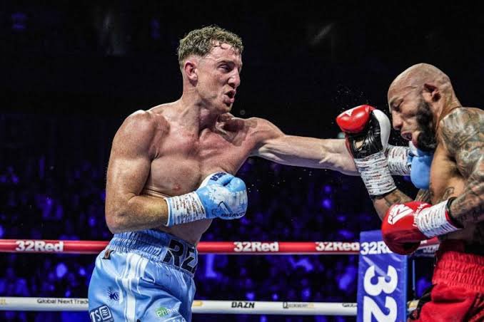 BuryEmBoxing's tweet photo. Bradley “The Sting” Rea vs Liam “Cannonball” Cameron 🥊

This ain’t gonna be pretty.

This is one of those fights where technique takes a backseat and intent drives the car.

Because the nicknames almost tell you how this fight is going to feel.

Cannonball - not slick or subtle. He’s coming straight at you, heavy, committed. When he lets that right hand go there’s no disguise, no finess, just impact.

But here’s the problem with a cannonball—It’s powerful, but it’s predictable.

The sting? Quicker. Sharper. You don’t always see it coming, but you feel it immediately and then it keeps coming.

Start with Cameron.

At 35 years old, there’s a lot of mileage there. High guard, minimal head movement, slow jab (that he pushes instead of snapping) wide left hook—technically, there are gaps. That guard is like a shield you hold up while walking into traffic. It might block some of it, but not everything.

And when he opens up? That left hook comes wide, that right hand comes heavy, but there are windows there. Big ones.

He’s upright, predictable and he absorbs punishment. And with that scar tissue, when he gets hit clean, it shows.

Now Rea…

Younger. Faster. Better engine. More output. He’s got that Rottweiler in him. He enjoys the fight. And when he smells something? He doesn’t hesitate, he tries to finish you.

But he’s not perfect.

Head comes down inside. Gets hit with straight shots at mid-range and that’s where Cameron’s right hand is most effective.

Now stylistically, this becomes very clear:

Rea is going to bring the fight. He’s going to push Cameron back, test that high guard and force exchanges. And when Cameron opens up, because he will, that’s where the danger lies for him.

Because those wide shots, those slower entries?

They create windows. Floor-to-ceiling sized windows.

So Rea, with faster hands, he’ll exploit those opportunities with counters, especially that right hook he likes to throw with bad intentions.

I would be remiss if I didn’t mention that Rea has defensive holes as well. The type of hole they found Saddam hiding in. When he’s in mid-range, he can get caught with straight right hands. Lyndon Arthur clawed his way back into the fight and secured a MD win vs Rea on the strength of those right hands. That’s Cameron’s best punch.

So how do I see it playing out? 

Rea is gonna bring the hornet’s nest—volume, pressure, speed. He’s gonna push Cameron back, try to overwhelm him, try to break him down.

Cameron?

He’s gonna try to plant his feet and fire that cannon. 

Rea’s engine, his pace, his willingness to force exchanges—those things accumulate. Cameron’s slower hands, his lack of head movement, his tendency to absorb punishment—that starts to take a toll.

And that scar tissue?

It becomes part of the story.

Prediction: Bradley Rea by late stoppage.

Because in boxing, when one fighter is throwing with weight and the other is striking with speed, volume, and precision— eventually, the sharper weapon starts to cut deeper.

*At this time, there are no lines on a stoppage, but if you want to play it safe then take Rea on the ML at -200 or you can add him to a parlay.

Ekow Essuman on the ML (+185) + Bradley Rea on the ML (-200) = +328

That’s my double right hand of the week.

#WardleyDubois #MorrellChelli #RaffertyEssuman #JalolovSmakici #DontBlink #Queensberry #DAZN #Boxing #Boxeo