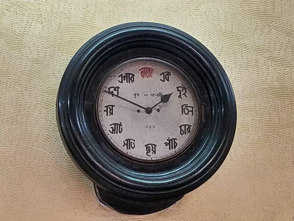 Fintech03's tweet photo. Did you know there is a 160 yr old British clock in Kolkata that speaks only Bengali? In 1858, the legendary Bhim Chandra Nag refused a gift from London's top clockmaker because it used English numerals. He forced the British to paint a clock face in Bengali just so his workers could tell the time. This is the story of how a sweet maker made the Empire tick to his tune.

In 1858, the world-famous British clockmakers Cooke & Kelvey opened their doors in Calcutta. The founder, Thomas Cooke, was a fan of Bhim Nag’s sweets. 1 day, while eating Sandesh, he noticed something strange: the most famous sweet shop in the city had no clock. Cooke offered to gift Bhim Nag a grand, high-end mechanical clock from London.

Bhim Nag did not say thank you. He looked at the clock and said, "My workers are local craftsmen. They do not know English. They cannot read your Roman/English numerals. This clock is useless to us." Thomas Cooke was so impressed by this Sovereign pride that he took a stencil of Bengali words (এক, দুই, তিন, চার...), sent it back to his factory in London, & had a custom clock face painted in Bengali.

The clock arrived in 1858, a Swiss-machined, London-painted clock with Bengali digits. That clock is still ticking on the wall of the Bowbazar shop today. It is 1 of the only mechanical clocks in the world where a British company was forced to learn an Indian script just to tell the time in a sweet shop.

It stands as a silent monument to the time when a Bengali Moyra (confectioner) made a British tycoon bow to his language. Most people have heard of the sweet Ledikeni, but the unknown part is the level of Genocide-prevention involved.

In the mid-1850s, India was boiling with the 1857 Revolt. Lord Canning was the Viceroy, & his wife, Lady Canning, was trying to bridge the gap b/w the British & the Indians. For her birthday, she wanted a sweet that was Neither British nor Indian. Bhim Nag was summoned.

He took the Pantua (an Indian fried sweet) & elongated it, stuffed it with a secret blend of Kheer, & gave it a unique texture. Lady Canning loved it so much that she became a regular patron. It calmed the High Society tensions of the time. The sweet was named Lady Canning, which the local Bengalis, in their typical style, shortened to Ledikeni.

Everyone thinks Chocolate Sandesh is a modern invention (like the 2012 Cadbury campaign). It was actually invented in the early 1900s at at Nalin Chandra Das & Sons. A regular customer named Bishwajit Ghosh returned from England with a tin of Cocoa Powder & challenged the owner, Bhoot Nath Das, to make something European with it. Bhoot Nath concocted the 1st ever chocolate Sandesh decades before global chocolate brands even entered the Indian market. He essentially de-colonized chocolate by wrapping it in Chhena (cottage cheese).

These sweet shops were not just kitchens; they were cultural laboratories. Bhim Nag forced the British to speak Bengali through a clock. Nalin Das beat the Europeans at their own chocolate game.

We eat these sweets for the sugar, but we should eat them for the Spine. These are the only brands in the world where the Product was so powerful that the Colonizer had to change their clocks & their names just to get a taste.