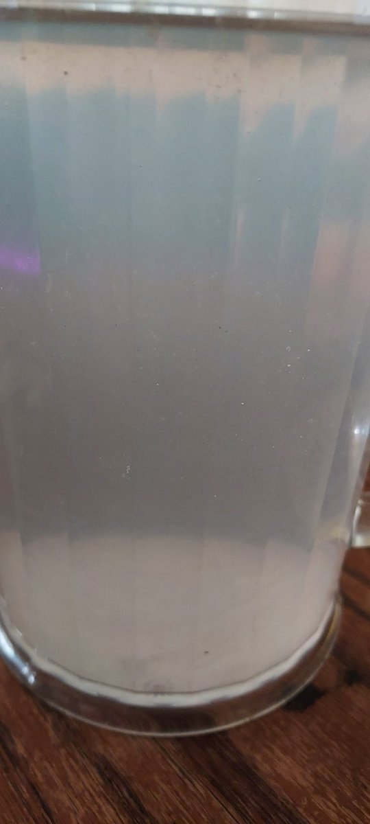 This is a pitcher of water with Dole fruit water flavor drink packets in it. 

This is what they look like now without dyes.

Honestly I don't notice a flavor change.