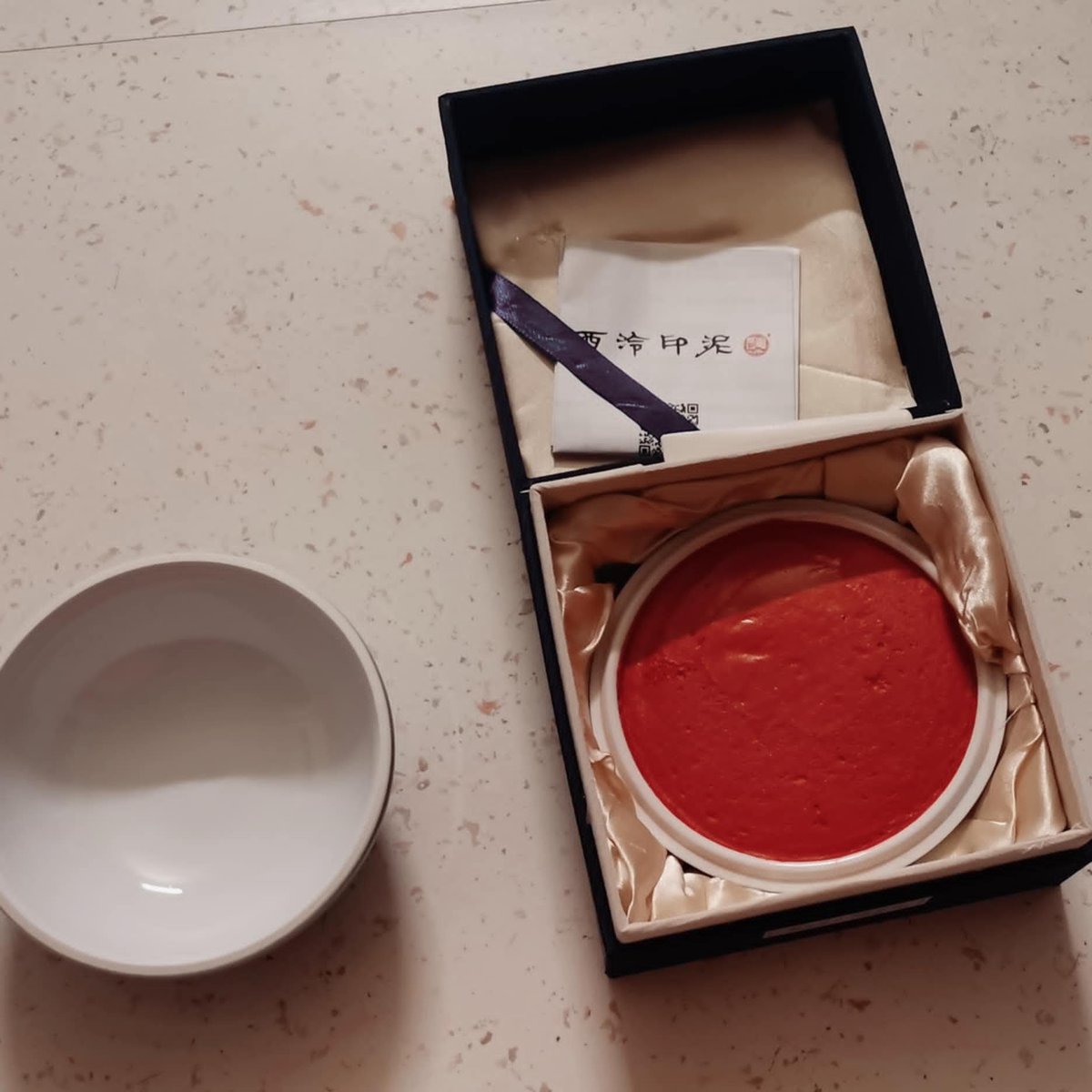 Managed to get 150 grams of 西泠印泥. Tested it on a recent seal