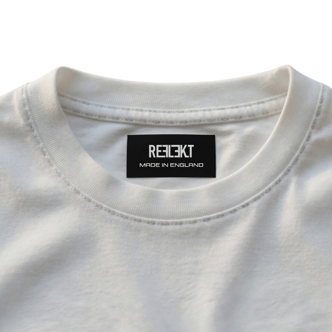 reflektclothing's tweet photo. Made in England 🏴󠁧󠁢󠁥󠁮󠁧󠁿 from start to finish.

The Sovereign T-Shirt represents a refined expression of British strength, identity and craftsmanship. Built from luxury 100% cotton in a heavyweight 280 GSM interlock, it delivers a structured, premium feel with a smooth, durable finish designed for everyday wear.

Forged in honour of Britain’s enduring spirit, this sovereign design commemorates the year 1958, a symbolic marker of post war resilience and renewal. Issued by the Reflekt Mint, its Latin inscription, “Ex Britannia Fortitudo Regnat,” translating to “From Britain, Strength Reigns,” stands as a tribute to British heritage and the quiet power of those who build with intention.

The artwork nods to the iconic sovereign rings that became a staple of British culture, bold pieces set with sovereign coins, worn as statements of pride, identity and status across generations. Their popularity has endured for decades, symbolising both tradition and individuality. This graphic draws from that same lineage: unmistakably British, unmistakably sovereign.

• Luxury 100% Cotton
• Heavyweight 280 GSM - Interlock
• Logo (front) & Flag (shoulder)
• Large graphic artwork (back)
• Insignia Patch
• Made in England

https://t.co/QshhDBygup