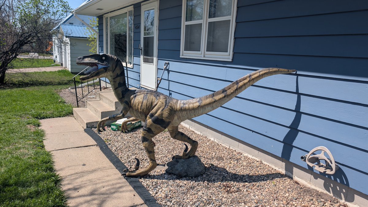 Scoubal's tweet photo. @Chris_Hawkey I know you are a fan of yard decorations. I just picked up a dinosaur, will definitely dress up for Christmas! https://t.co/CY3WVPg3Qo