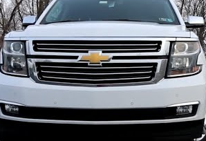 Faganator's tweet photo. @TheDoctorLogos "Check out this blue Tahoe with a black Chevy bowtie on it" - the people in this thread. ππ #ItsWhiteAndGold https://t.co/4M8uObHo5L