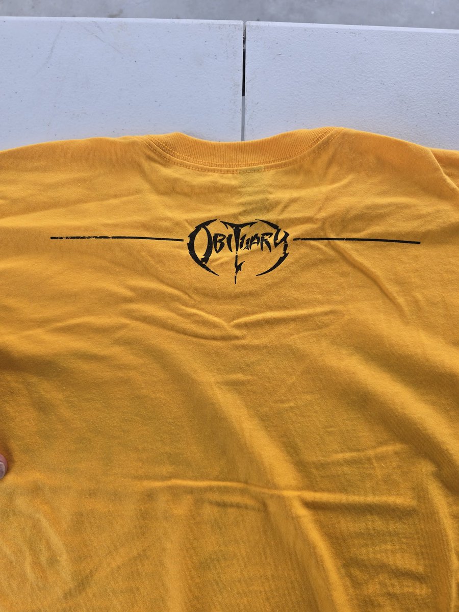 obituarytheband's tweet photo. Just got these in! Red, Yellow, White, Heather Blue and Heather Grey. Small logo on back too. Buy any 3 and get $15 refund. https://t.co/vcDkmIDylG https://t.co/yd0uYGM0Is