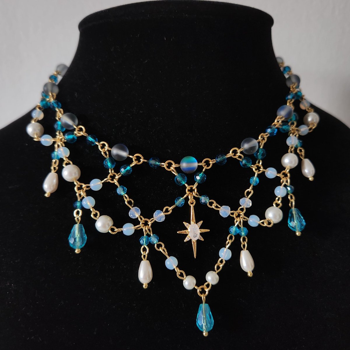 pondsizedocean's tweet photo. my mermaid and fairy necklace designs, 2021 vs. 2026 🧜‍♀️🧚 https://t.co/vxBVC85I5g
