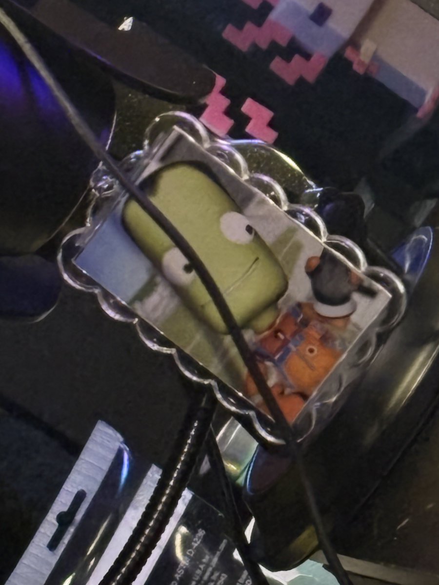i keep looking over at my photo of The Little Green One like it's the last picture i have of my late wife