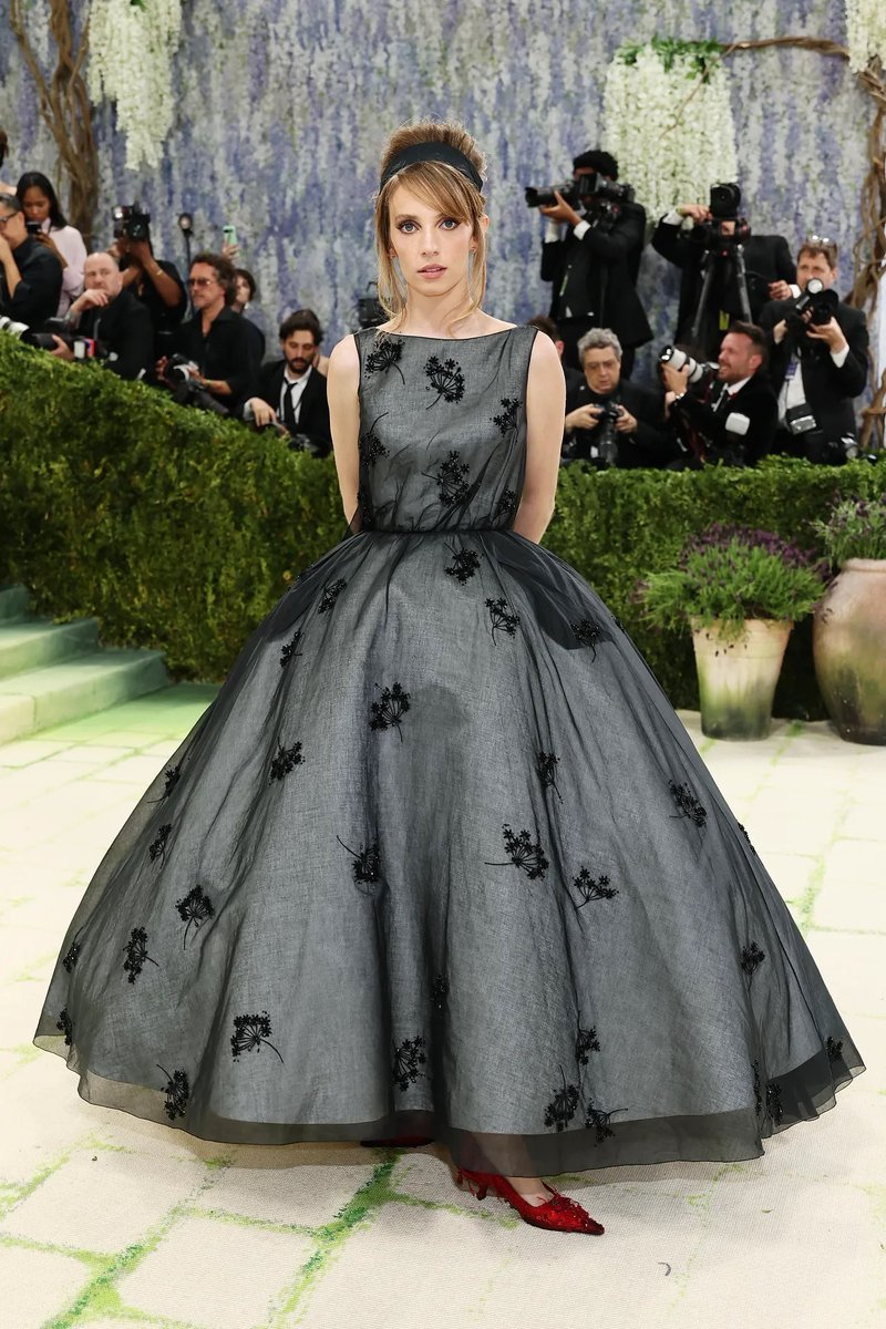 JudgeJackson's tweet photo. Maya Hawke in tulle overlay and ruby slippers. Swoon! 🖤♥️🖤

Totally reminds me of Audrey Hepburn in Sabrina. 

#MetGala https://t.co/FcdYunt47v