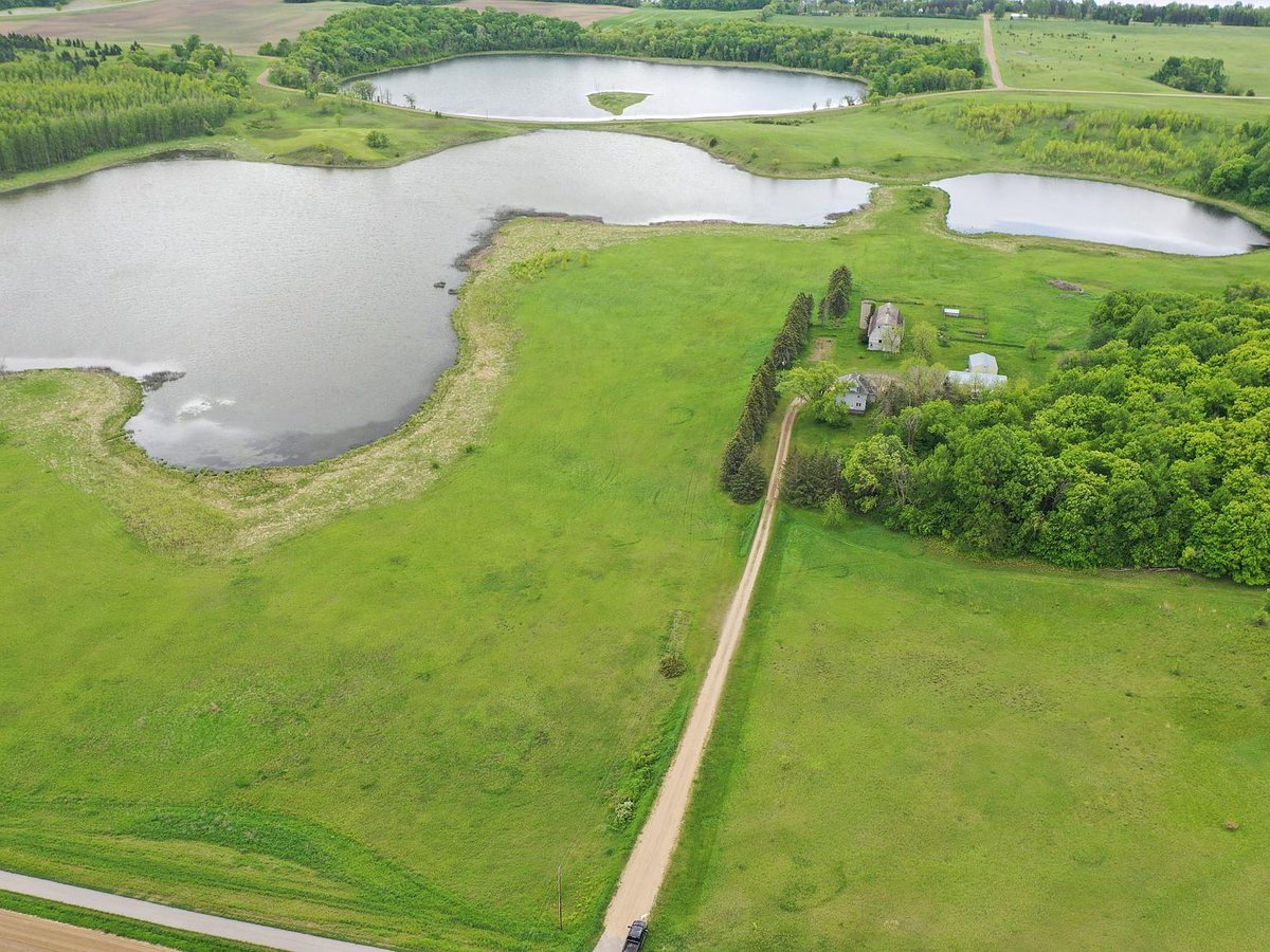 greenfuturetz's tweet photo. A real example of successful wetlands restoration. Restored ponds surrounded by native vegetation, fertile farmlands, and a healthy ecosystem that conserves water, enhances biodiversity, and supports sustainable agriculture. @WetlandOrg https://t.co/Q7DnKD7KYR
