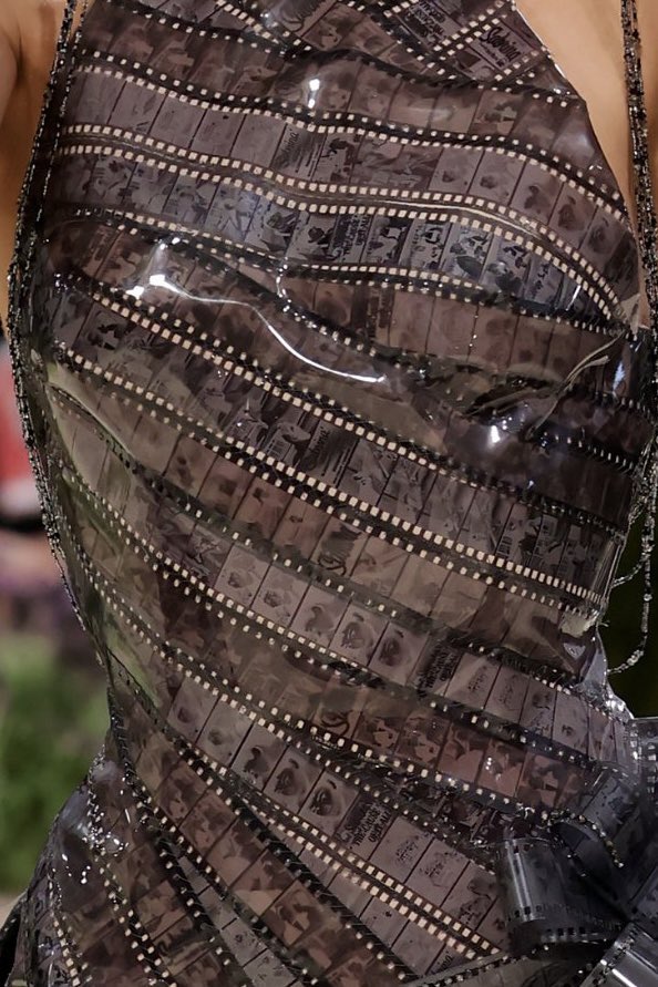 the way the dress is made of film strips of the actual movie