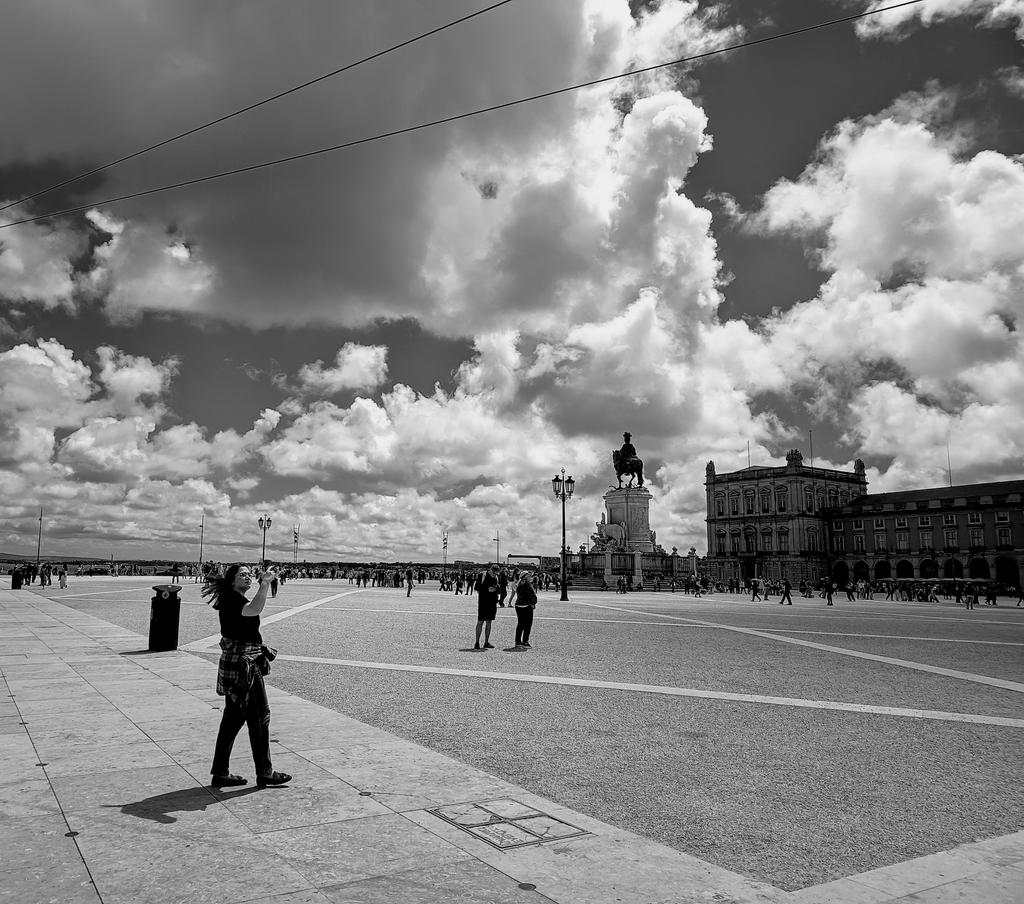 Chemfund's tweet image. Clouds across the square in Lisbon #monochrome #phonephoto