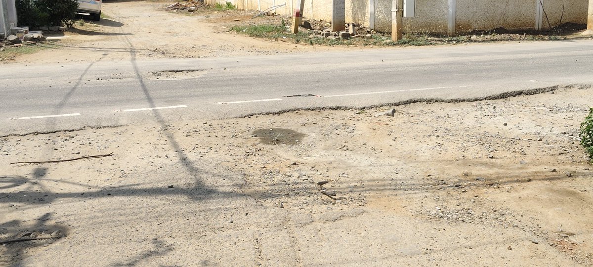 DeepakTmmk's tweet photo. Coimbatore Corporation Ward 97, Srinivasan Nagar Road work has been left incomplete for over a month. One side is done, but the other side is full of exposed iron rods, stones, and uneven surface. School children use this road daily High risk of accident.
@CbeCorp @CollectorCbe https://t.co/9ulO8GpNwl