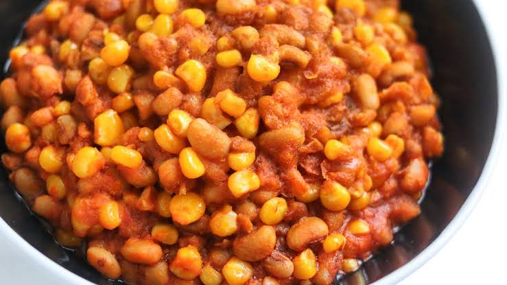 Not just beans and corn, there is a particular name we do call it in Yoruba land.

Once you ate a plate of  this in the morning, just get enough water to be topping it till the evening time.