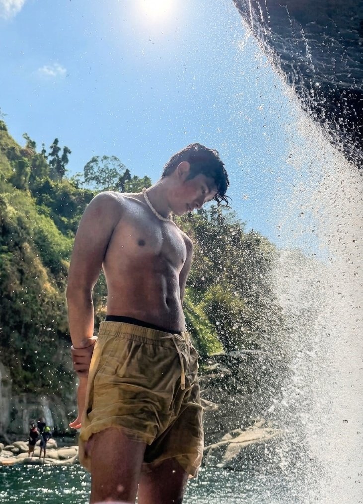 HORI7ON’s Winston looks sizzling and sculpted to perfection beneath the falls in a recent photo.