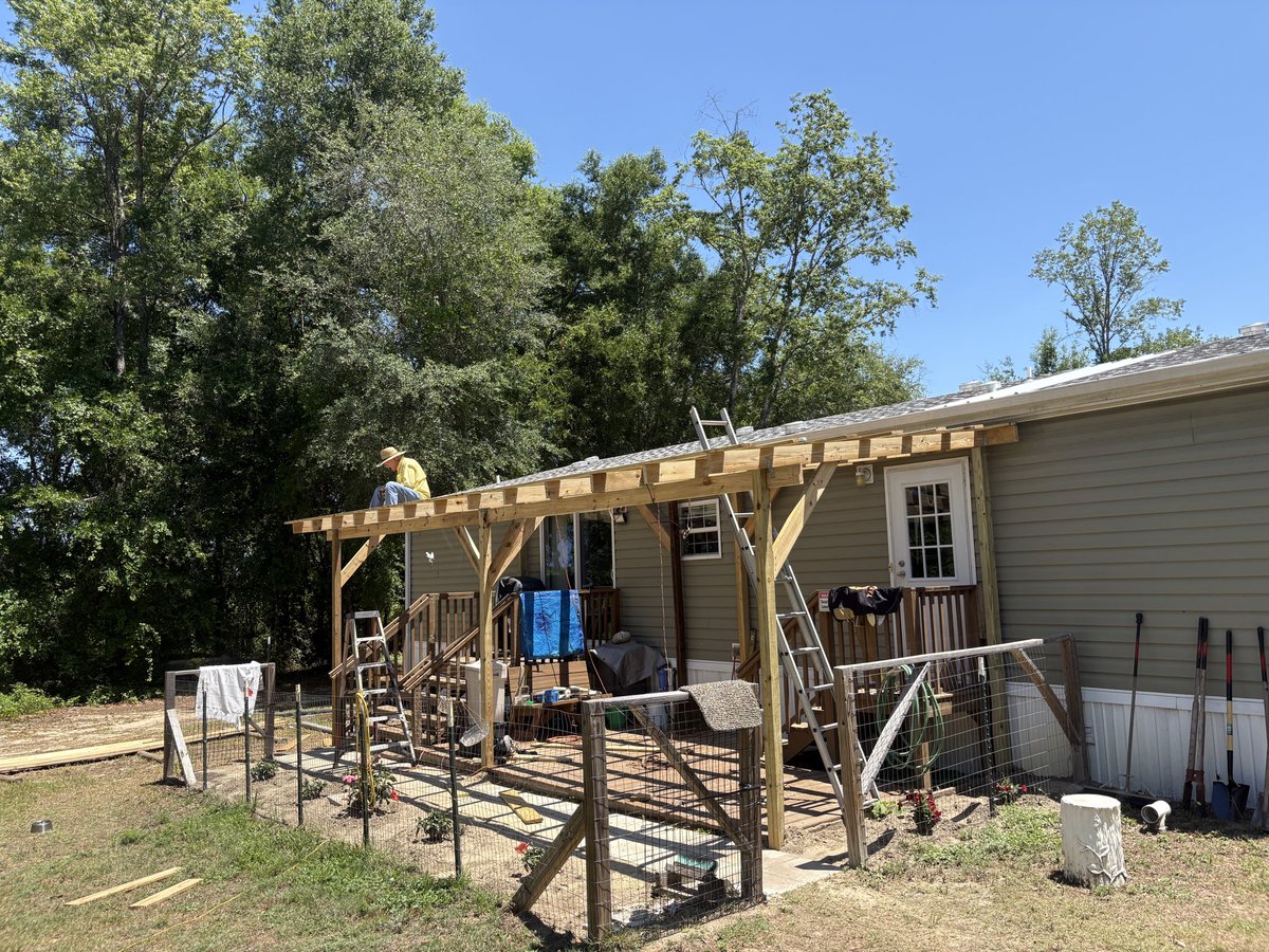 PhilWCC's tweet photo. Helped my dad put a roof on his porch. He listened to some of my ideas which is uncommon but cool. We helped each other solve problems, we confused each other about math, he taught me some stuff. Great few days. https://t.co/FmSQh43TgZ