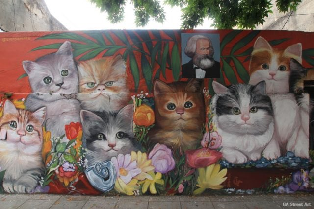 Karl Marx and cats mural.