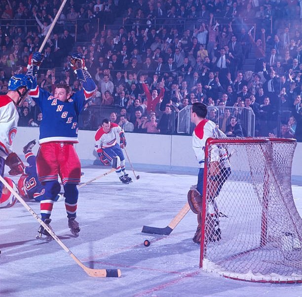 SayItIsSoJoe's tweet image. The #NYR Earl Ingarfield celebrates after scoring on the #Habs Rogie Vachon during game 3 of the 1967 #NHL Semi-final on April 11 at Madison Square Garden. #Habs won 3-2 and would go on to sweep the series and face the #Leafs in the Stanley Cup Final. #GoHabsGo 
📸: James Drake
